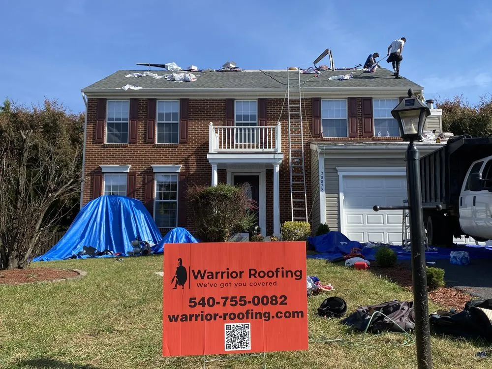 Slide of Warrior Roofing