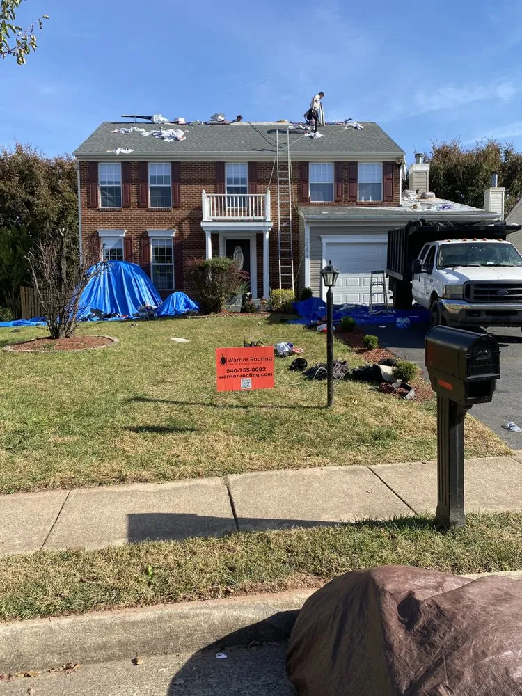 Slide of Warrior Roofing