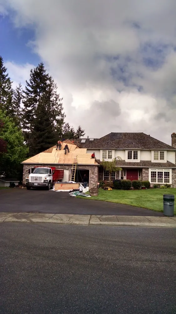 Slide of Washington Roofing Solutions