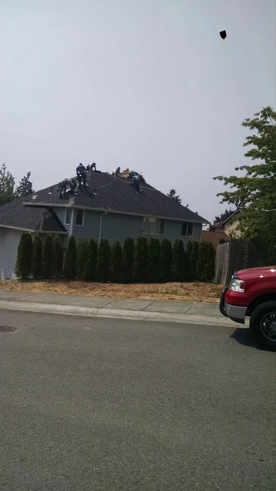 Slide of Washington Roofing Solutions