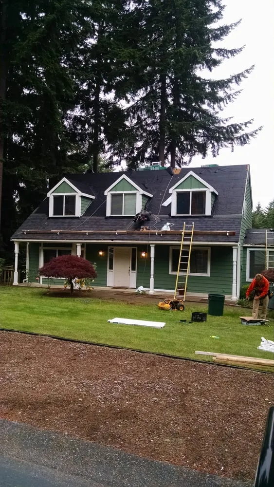 Slide of Washington Roofing Solutions