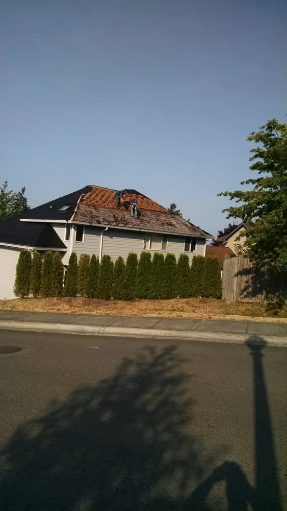 Slide of Washington Roofing Solutions