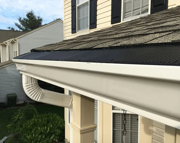 Slide of Water Service Quality Seamless Gutters & Roofing