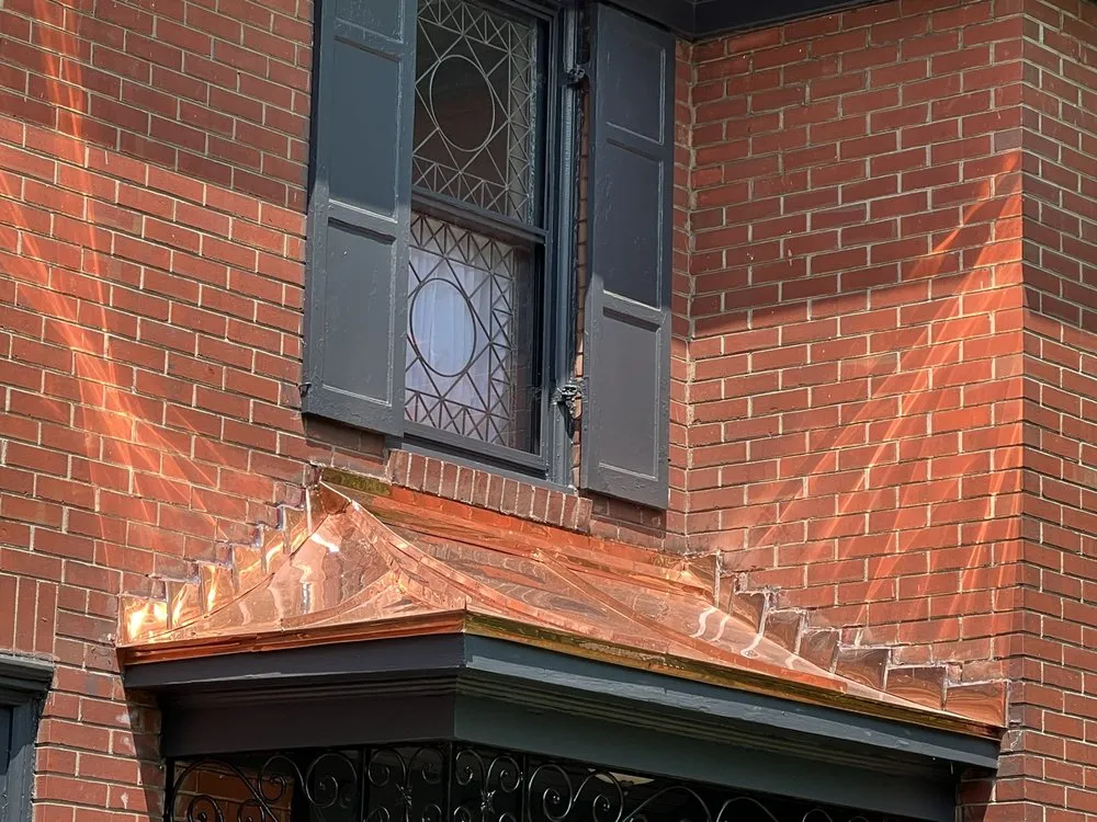 Slide of Watergate Roofing