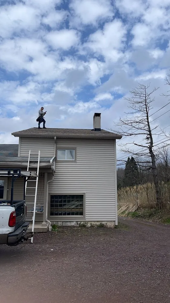 Slide of Watertide Construction and Roofing