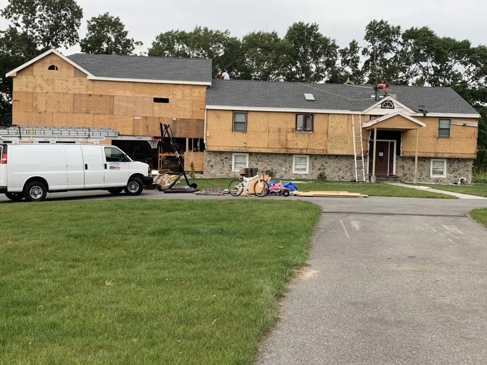 Slide of Watertight pro Roofing and Skylights