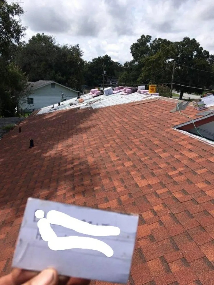 Slide of Waylon's Watertight Roofing