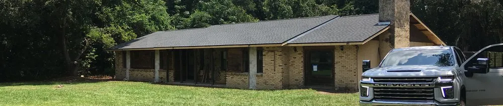 Slide of Waylon's Watertight Roofing