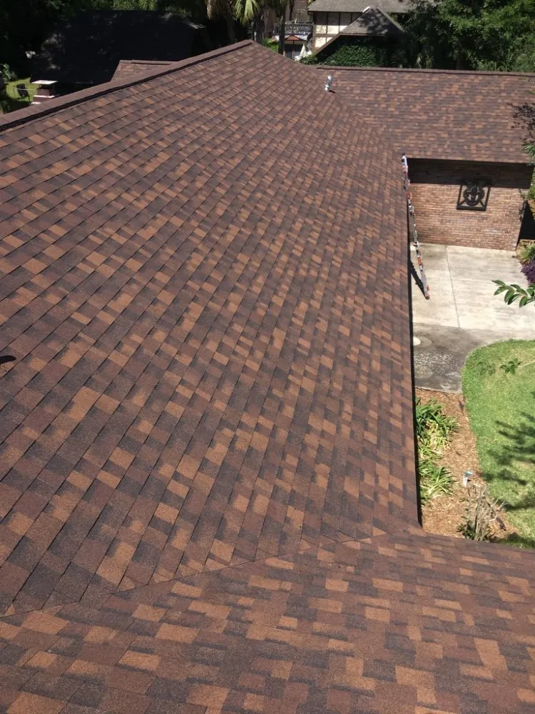 Slide of Waylon's Watertight Roofing