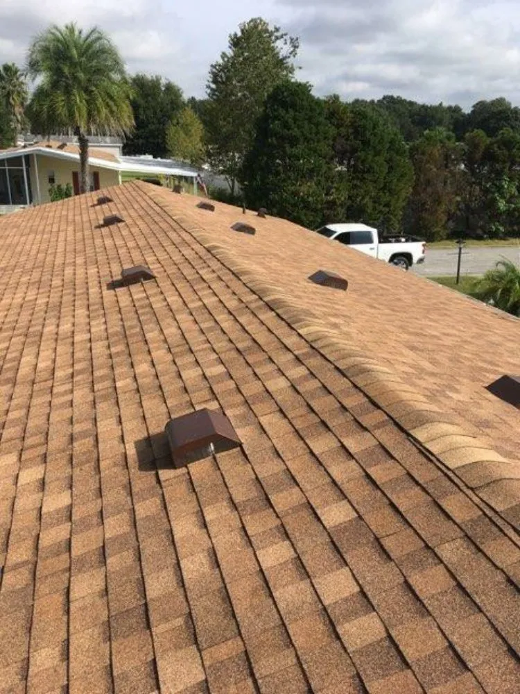 Slide of Waylon's Watertight Roofing