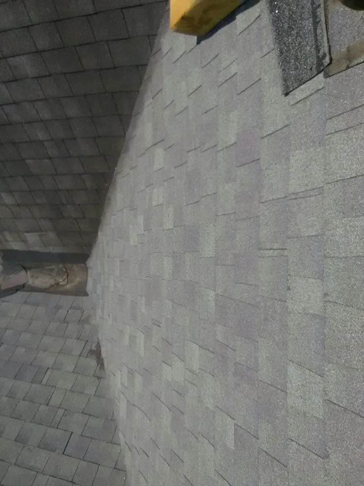 Slide of Wayne's Professional New Roofs