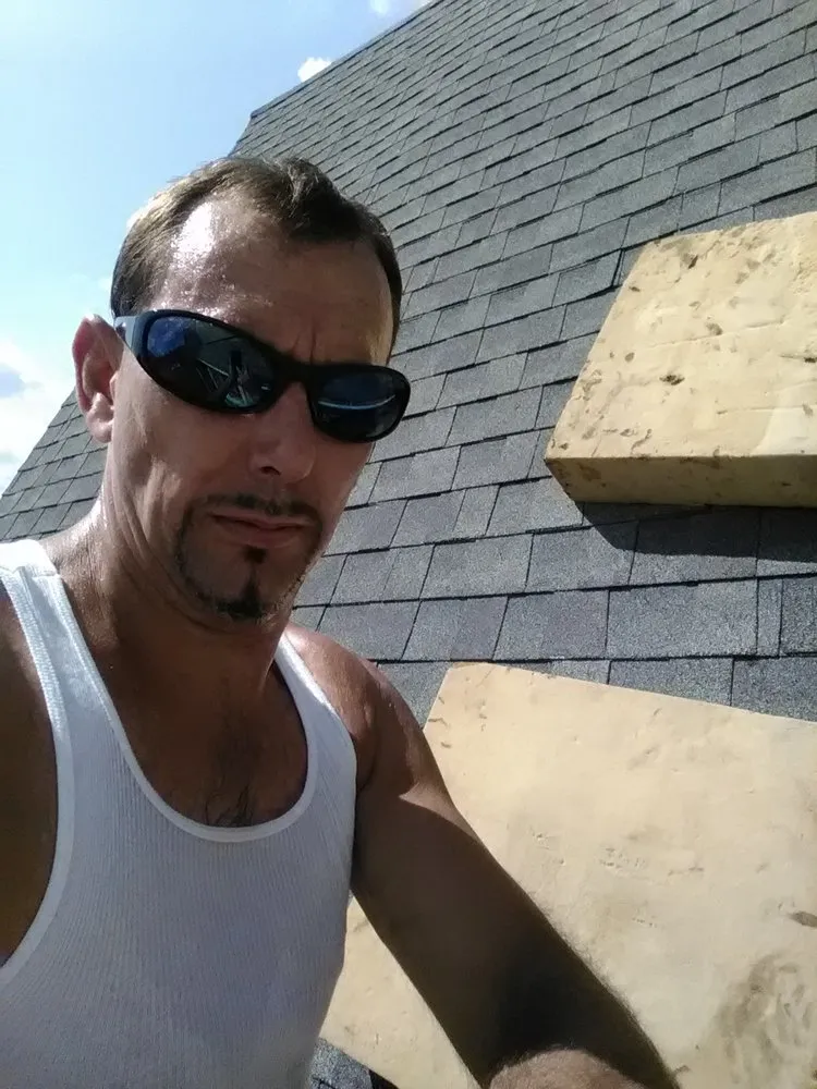 Slide of Wayne's Professional New Roofs