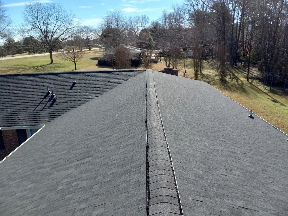 Slide of Wayne's Roofing