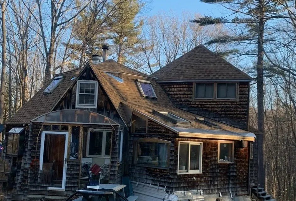 Slide of WE Brown Roofing