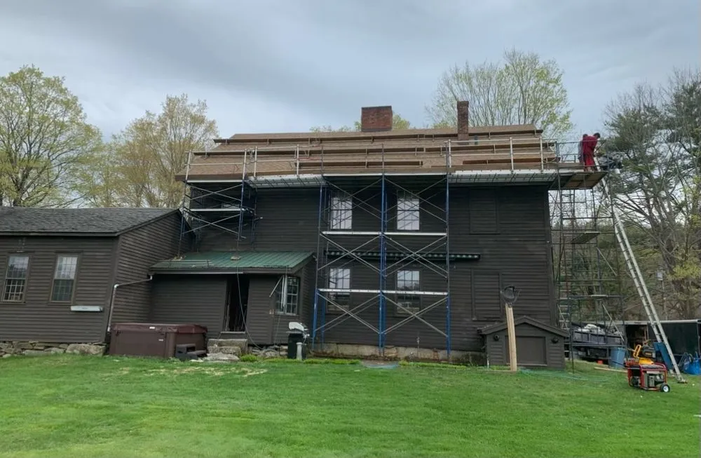 Slide of WE Brown Roofing