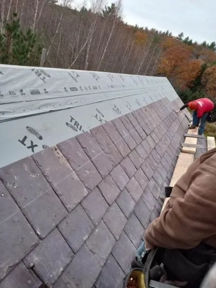 Slide of WE Brown Roofing