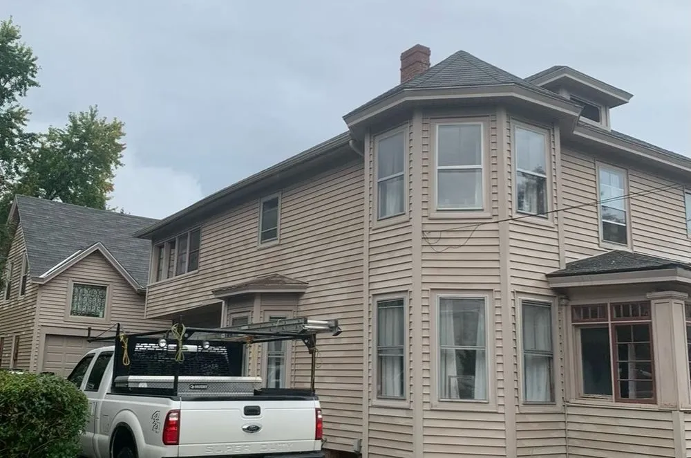 Slide of WE Brown Roofing