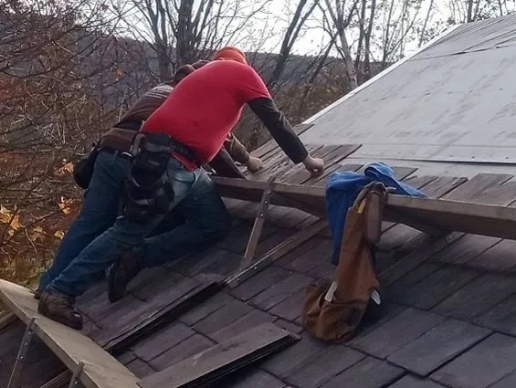 Slide of WE Brown Roofing