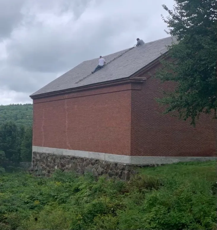 Slide of WE Brown Roofing