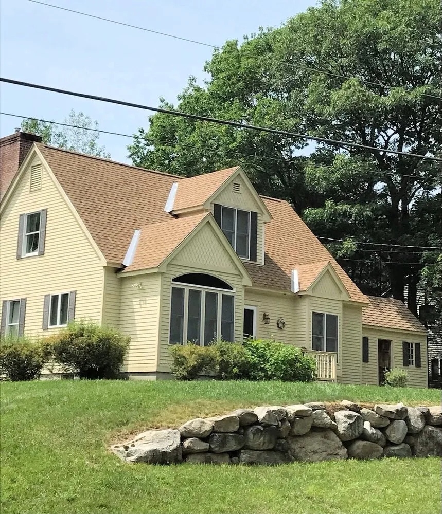 Slide of W.E. Brown Roofing
