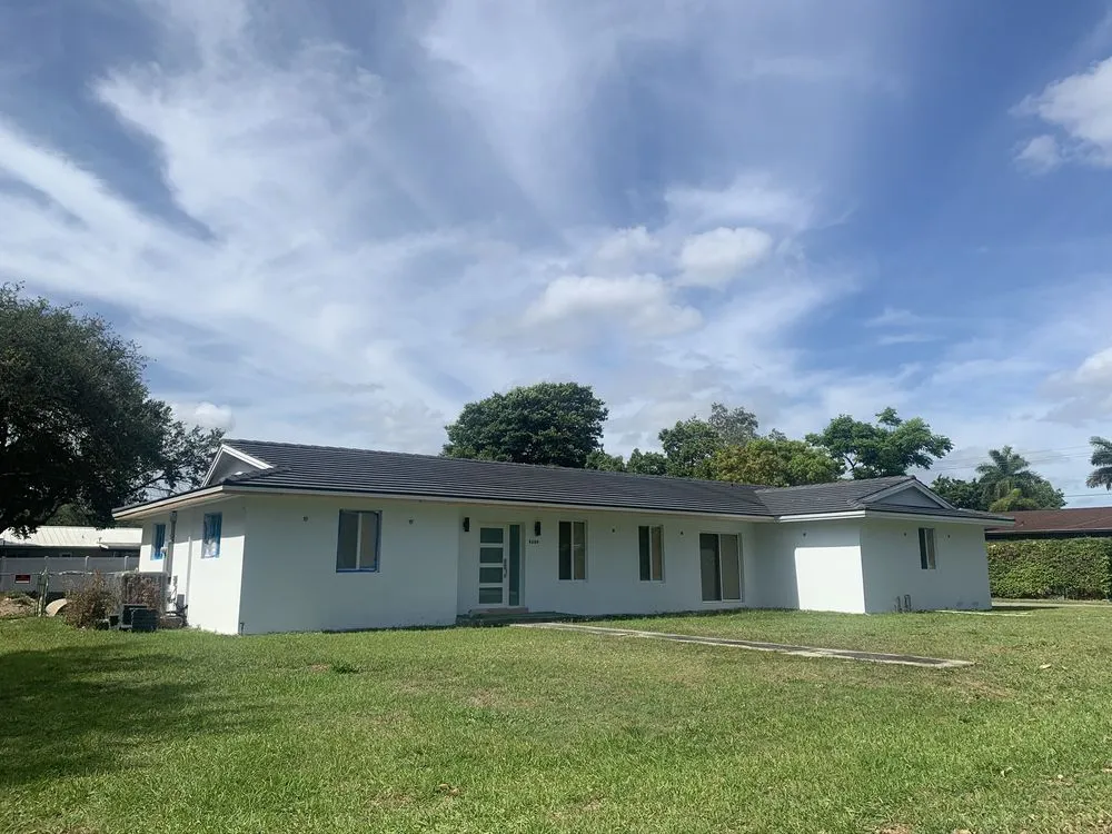 Slide of We Can Roofing