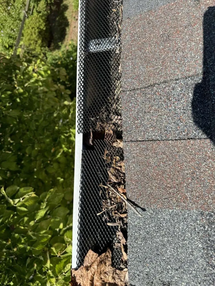 Slide of We Get High Roofing & Gutters