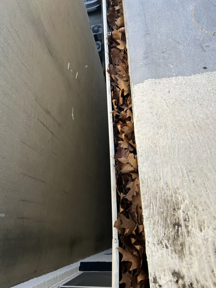 Slide of We Get High Roofing & Gutters