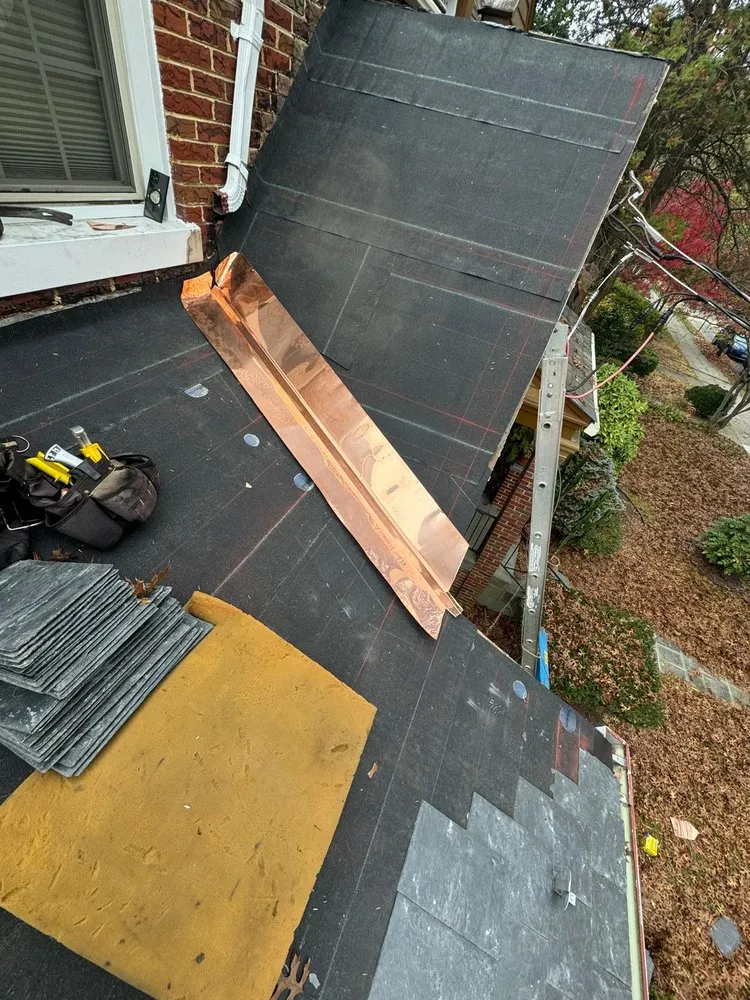 Slide of We Get High Roofing & Gutters