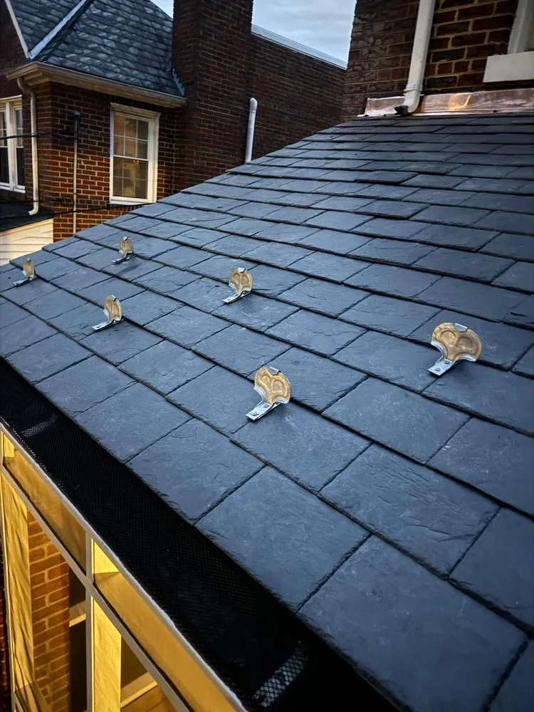 Slide of We Get High Roofing & Gutters