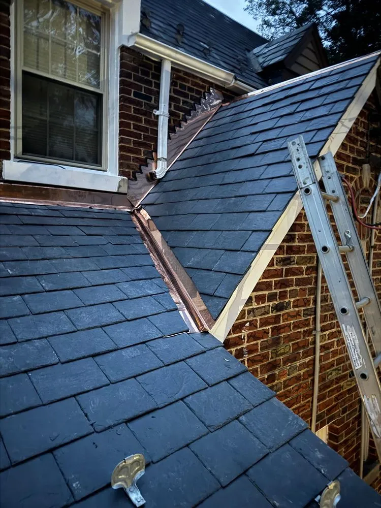 Slide of We Get High Roofing & Gutters