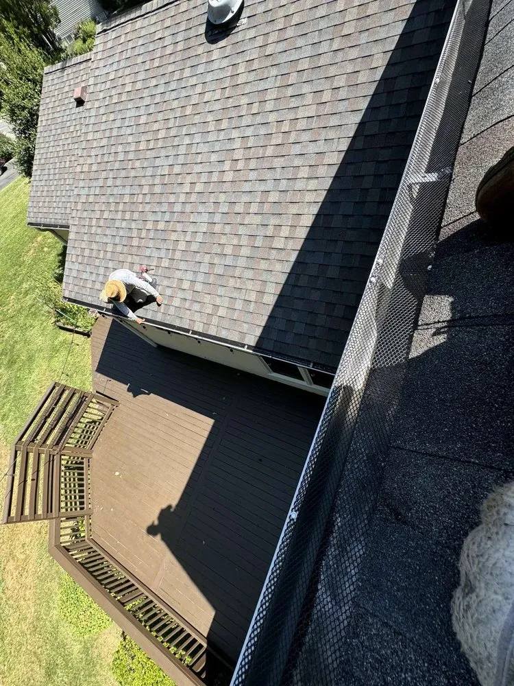 Slide of We Get High Roofing & Gutters