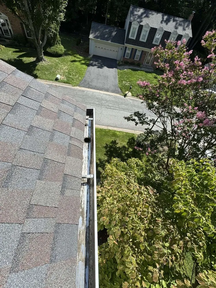 Slide of We Get High Roofing & Gutters