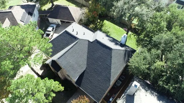 Weather The Storm Roofing Logo