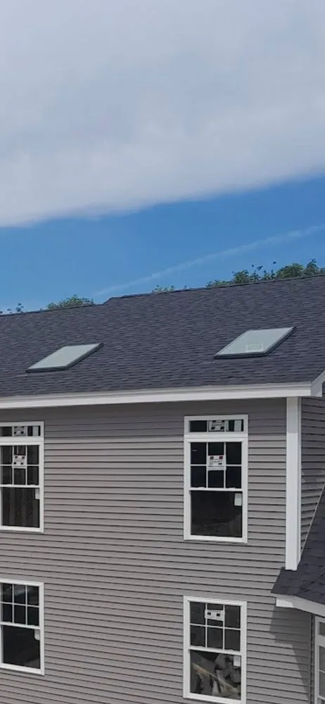 Slide of Weatherized Roofing And Gutters