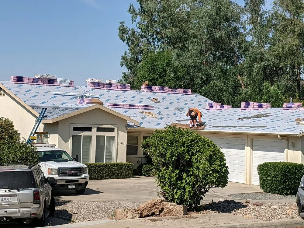 Slide of Weathermaster Roofing Services