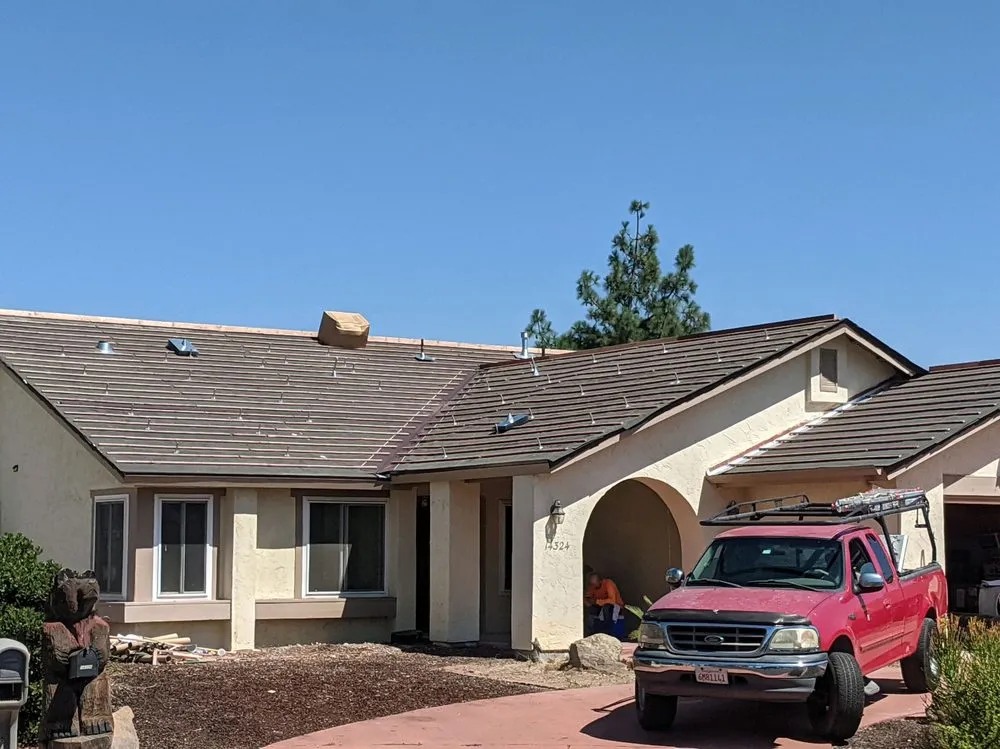 Slide of Weathermaster Roofing Services