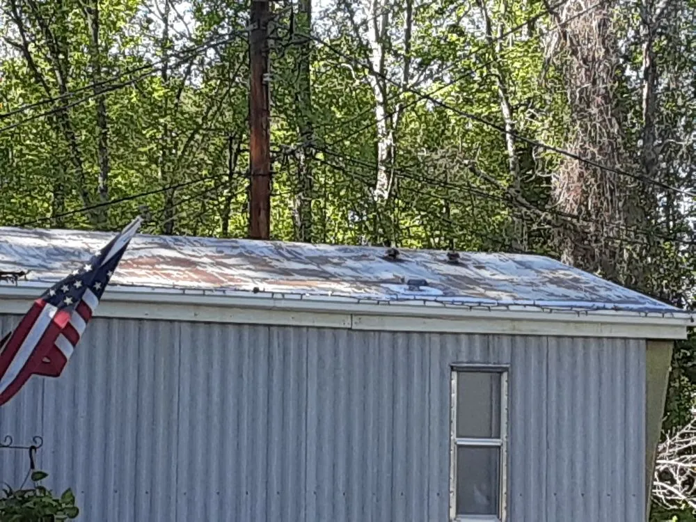 Slide of Weatherproof Roofing