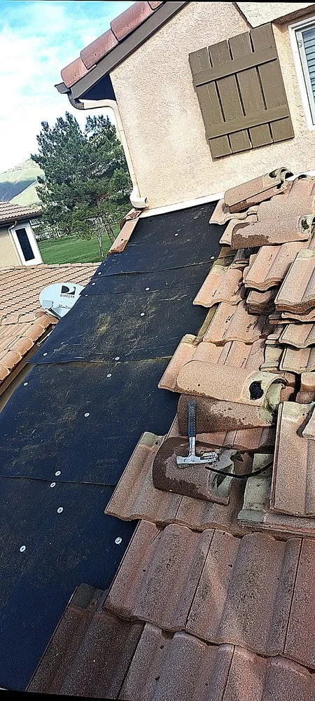 Slide of Weathertight Roofing