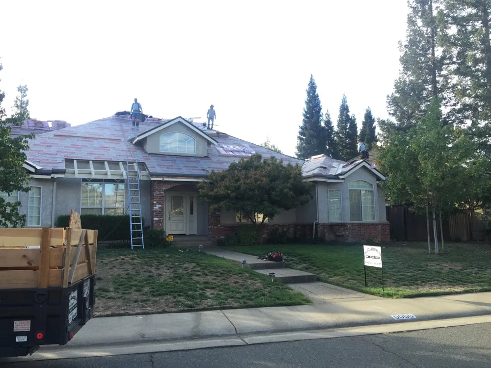 Slide of Weaver Roofing