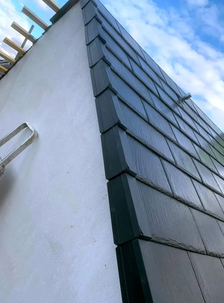 Slide of Weinland Park Roofing