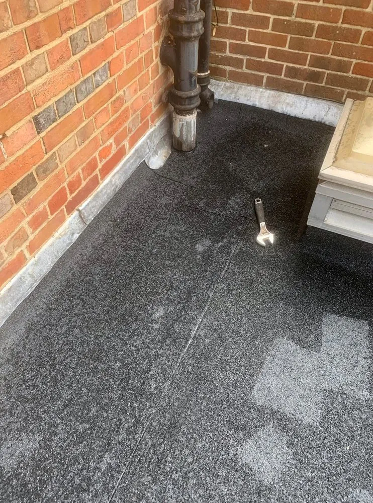 Slide of Weinland Park Roofing