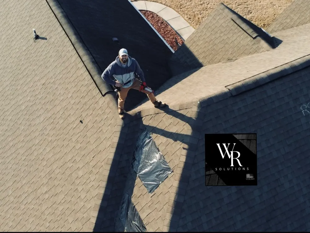 Slide of Welch Roofing Solutions