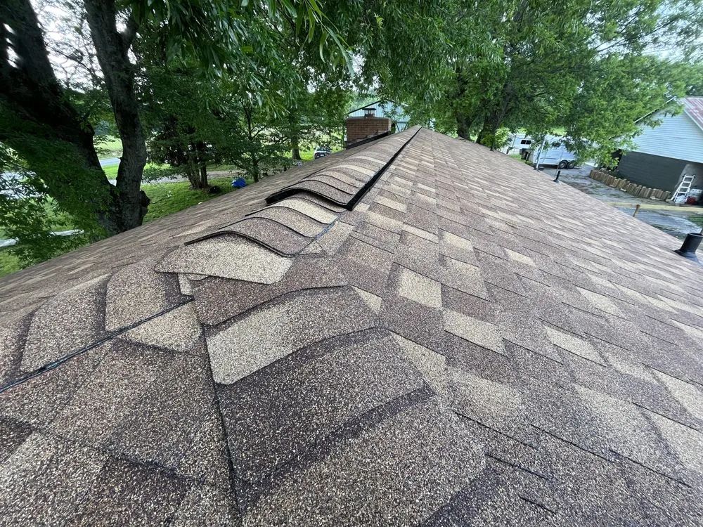 Slide of Welch Roofing Solutions