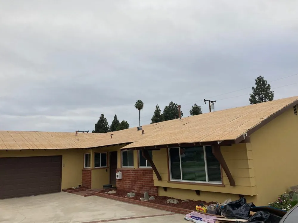 Slide of Wences Roofing Team