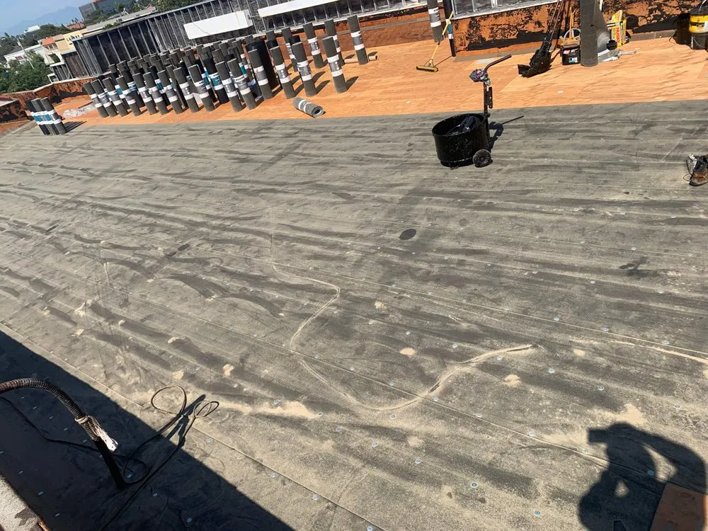 Slide of Wences Roofing Team