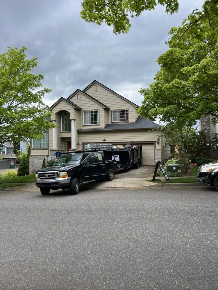 Slide of West Coast Roofers