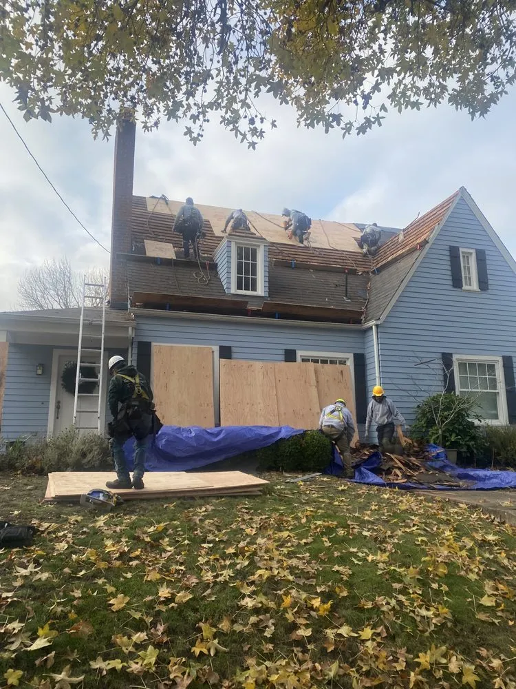 Slide of West Coast Roofing