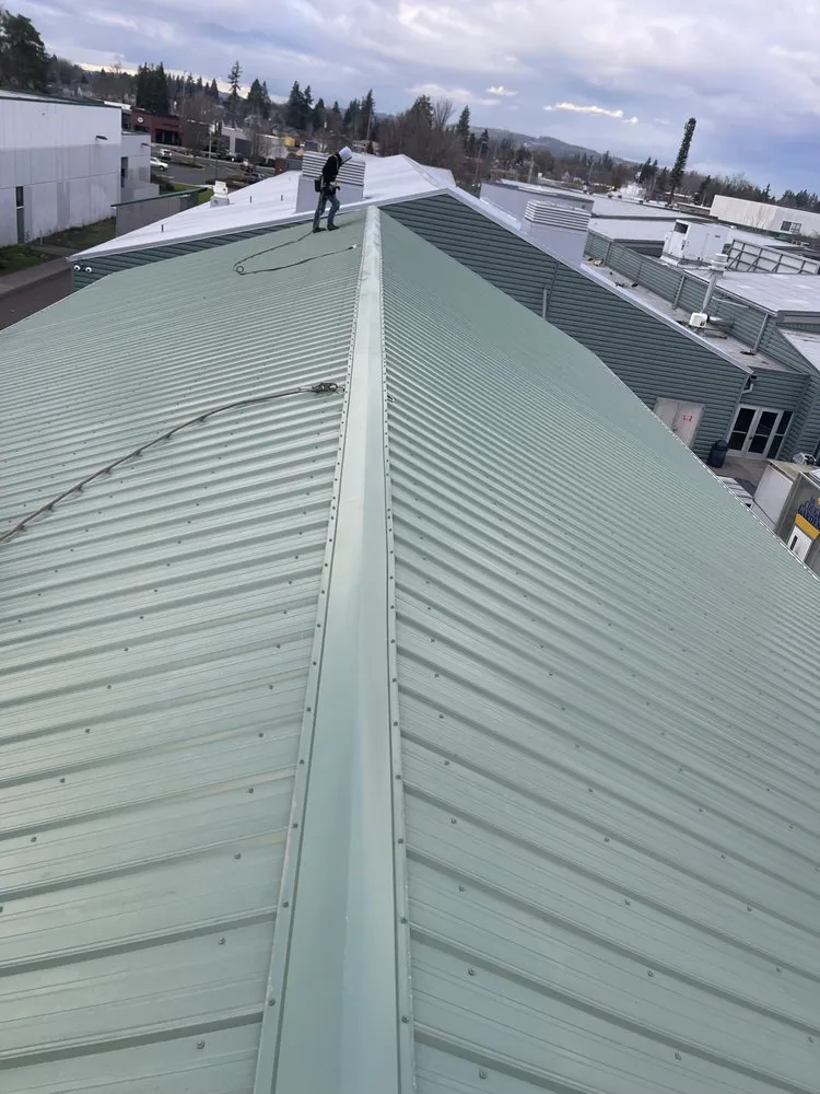 Slide of West Coast Roofing