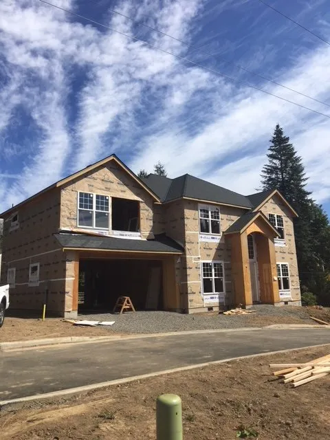 Slide of West Coast Roofing