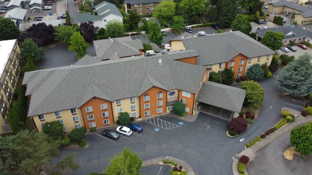 Slide of West Coast Roofing